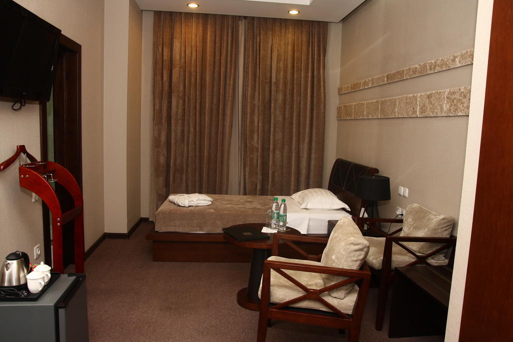 Grand M Hotel Navoi Phòng bức ảnh