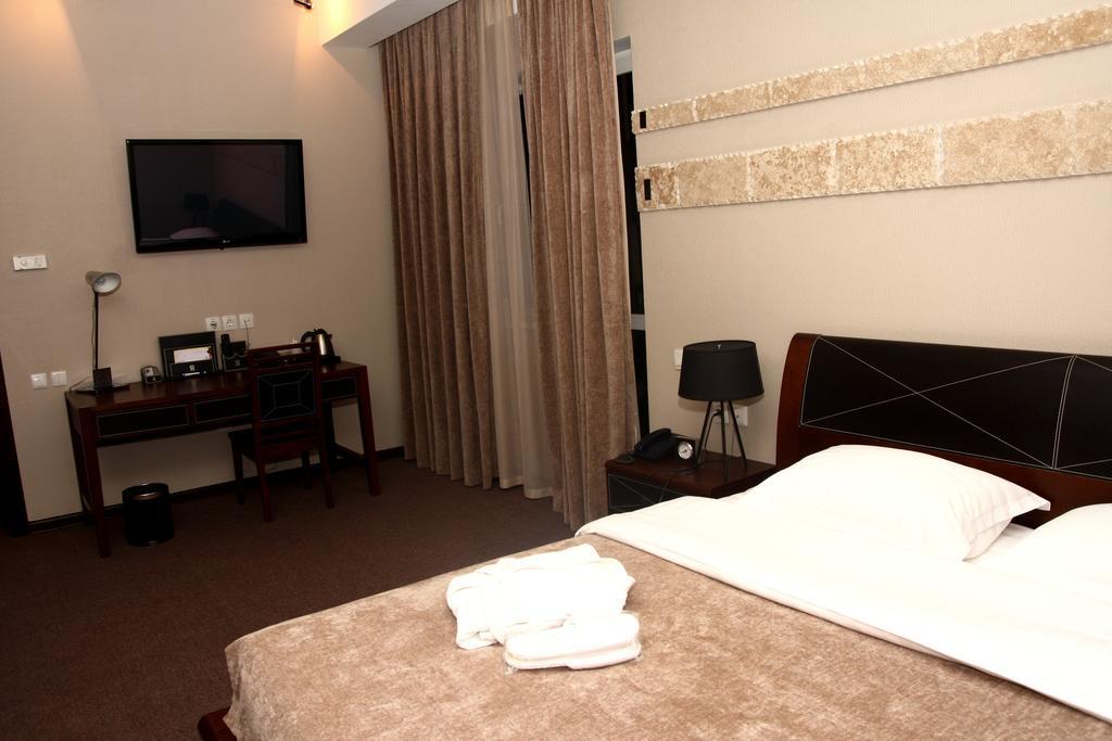 Grand M Hotel Navoi Phòng bức ảnh