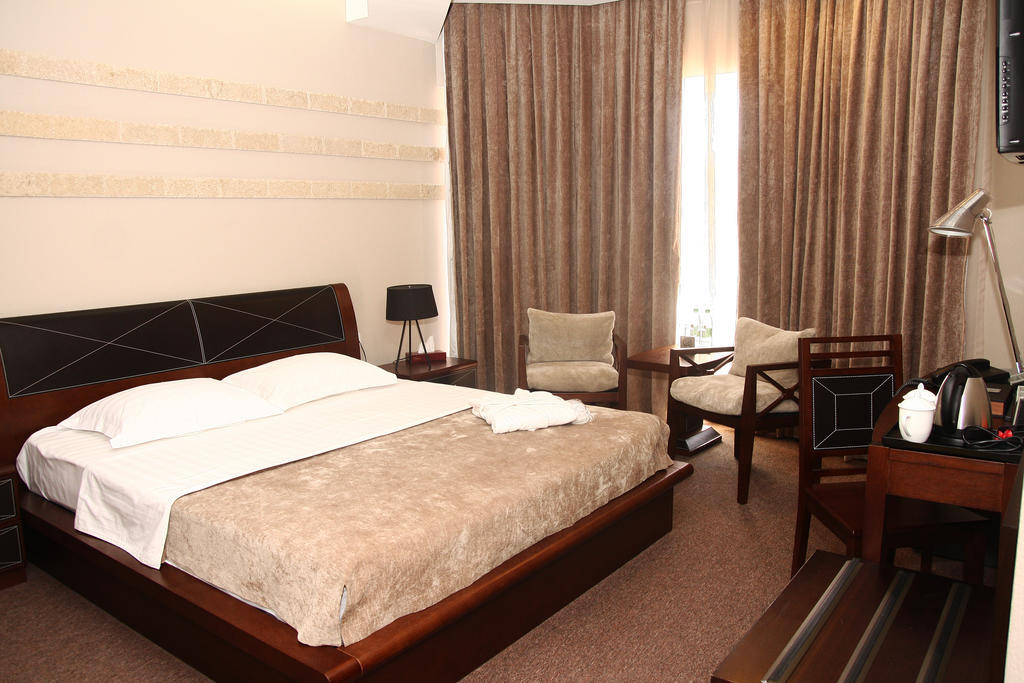 Grand M Hotel Navoi Phòng bức ảnh