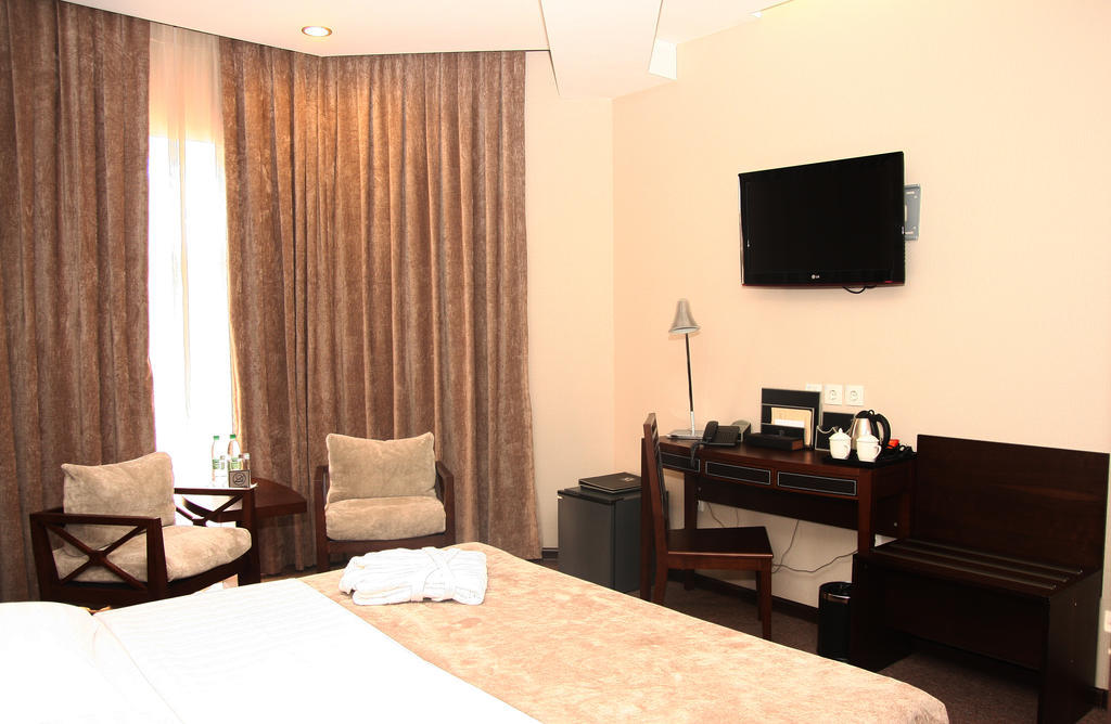 Grand M Hotel Navoi Phòng bức ảnh