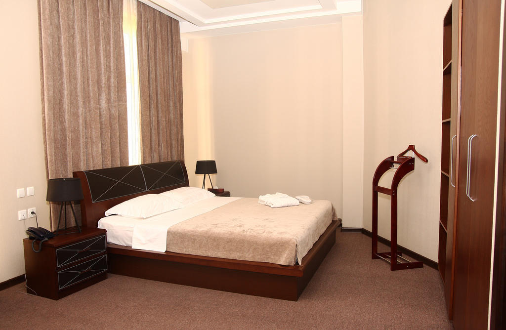 Grand M Hotel Navoi Phòng bức ảnh