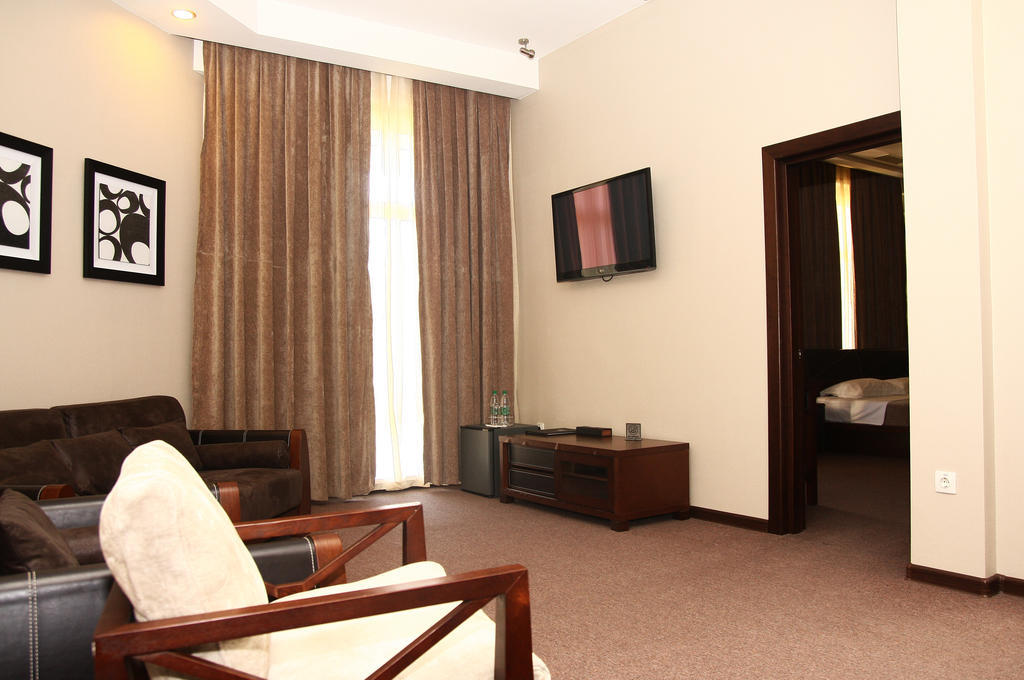 Grand M Hotel Navoi Phòng bức ảnh