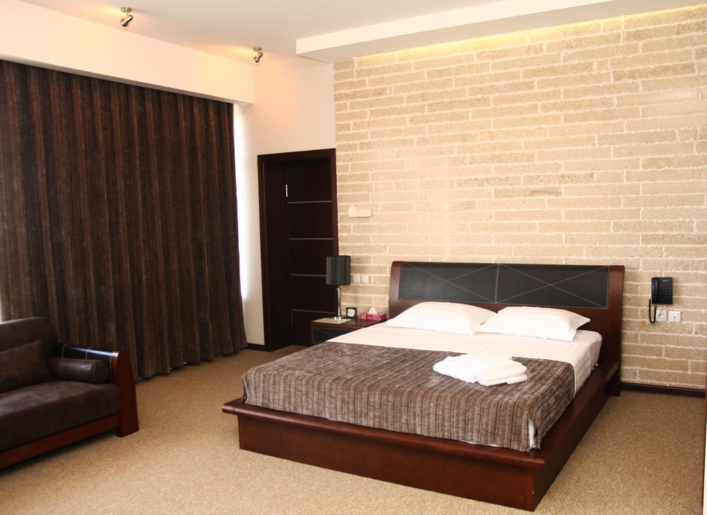Grand M Hotel Navoi Phòng bức ảnh
